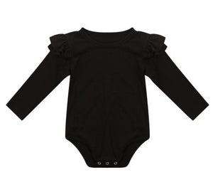 Long sleeve body suit with snaps and frills on the sleeves. 