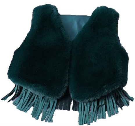 Our Bold Fur Fringe Vest is stunning! This faux fur is oh so soft and the color pops. The bottom of the vest has fringes. Perfect soft and cozy vest for the chilly days.