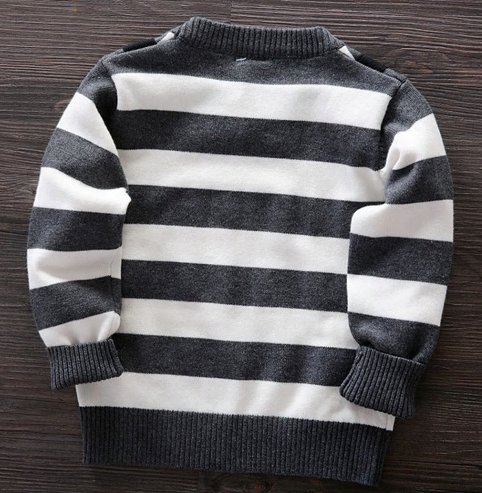 This trendy baby boy's grey striped sweater comes with attached suspenders and a black bow tie with white polka dots. 
