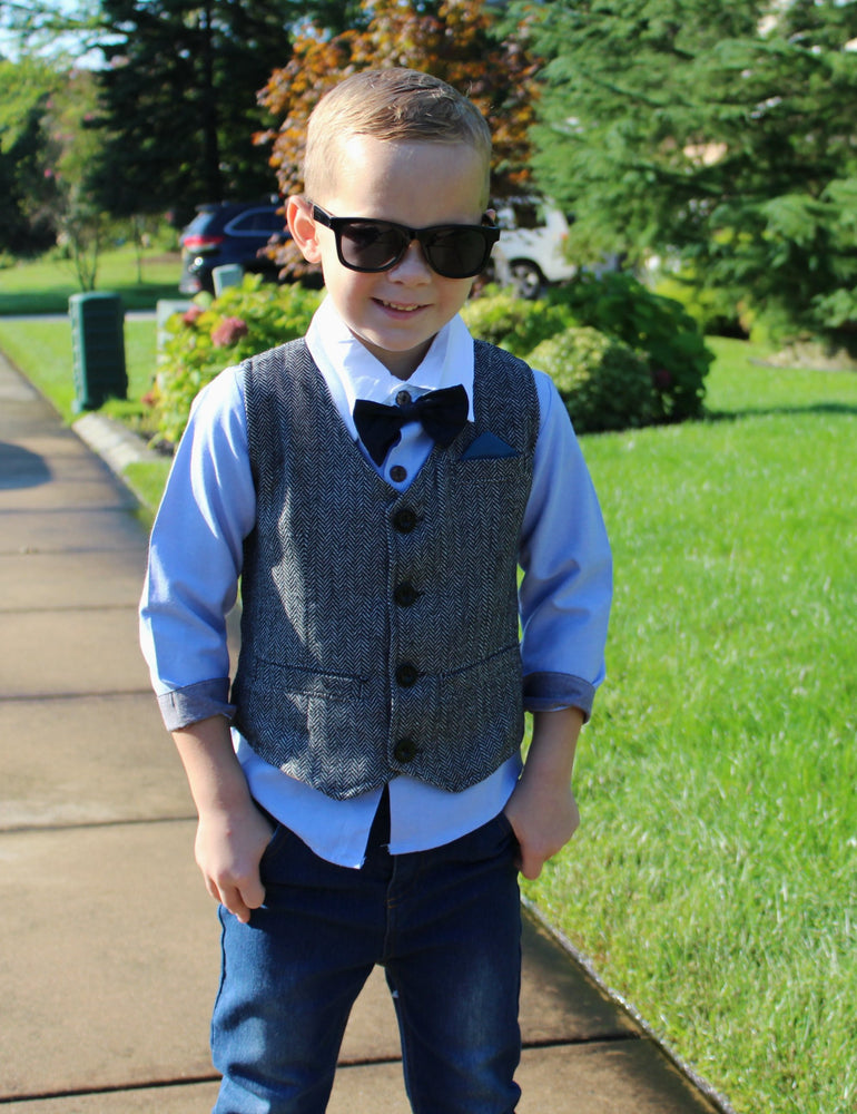 The Charlie 4 piece set is for the sophisticated little gentleman. This fashionable trendy toddler boy outfit comes with Long Sleeve Collared Shirt, Bowtie, Vest, and Jeans