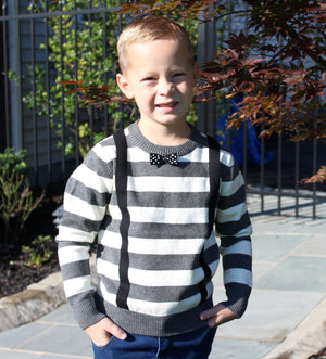 his trendy baby boy's grey striped sweater comes with attached suspenders and a black bow tie with white polka dots. 