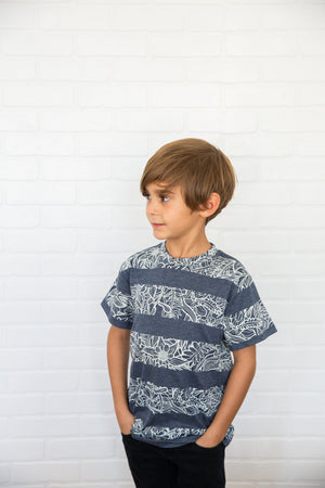 The Littlest Prince Navy & Cream Tropical Tee is perfect for island vacations or Spring/Summer days. The tropical print along with the bold blue colors will definitely have your little man standing out. This set is perfect for stylish brothers as well as for matching daddy