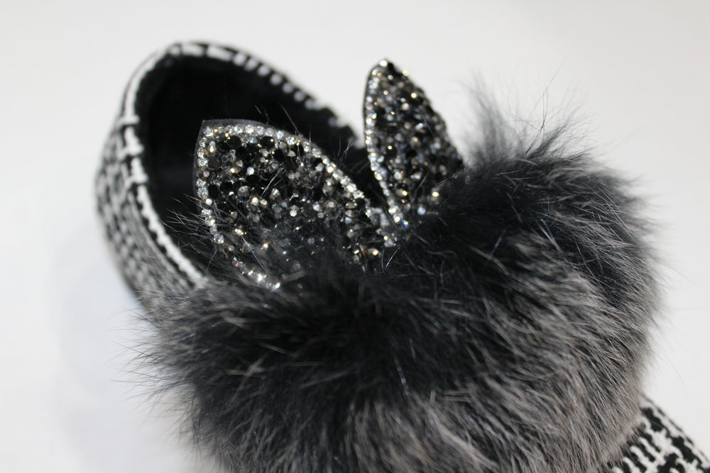 
            
                Load image into Gallery viewer, faux fur bunny ear shoes. The bunny ears are filled with black and charcoal rhinestones. 
            
        
