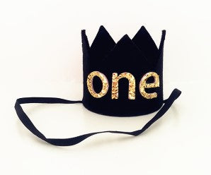 
            
                Load image into Gallery viewer, black crown with felt and the word ONE in gold glitter. There is an elastic band to keep headband on. 
            
        