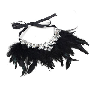 
            
                Load image into Gallery viewer, Our Diamond Glitz necklace is stunning!  This makes the perfect addition for our mini diva&amp;#39;s all the way up to our mama diva&amp;#39;s.This necklace sits high on top of your existing shirt and is lined with Solid black and hints of evergreen long feathers and shining crystals.  Mix and match with your mini for the perfect stylish accessory! 
            
        