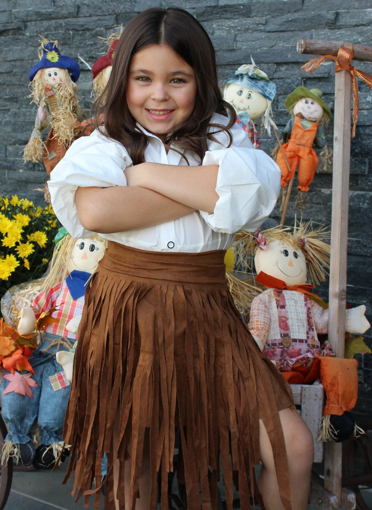 This toddler girl brown skirt is layered with suede fringe. The waist is elastic. 
